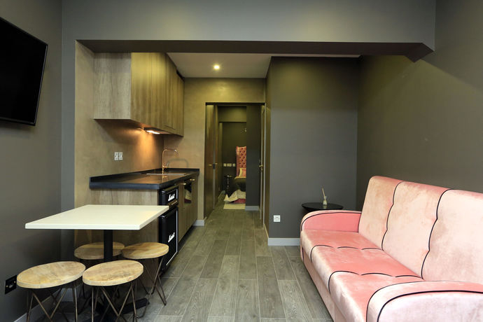 Imagen de la habitación del Charm Flats. Foto 8