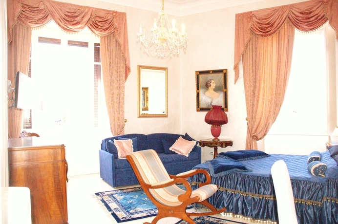 Imagen de la habitación del Charme Holidays Colosseum. Foto 10