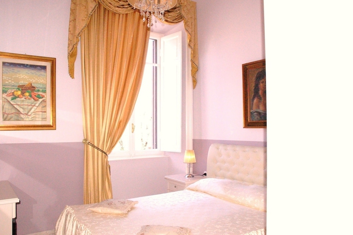 Imagen de la habitación del Charme Holidays Colosseum. Foto 14