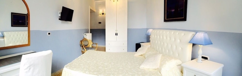 Imagen de la habitación del Charme Holidays Colosseum. Foto 19