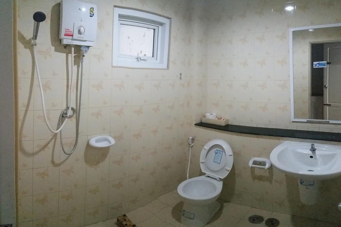 Imagen de la habitación del Charoen Apartment Trang. Foto 9