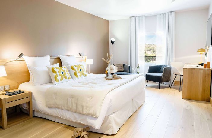 Imagen de la habitación del Chateau l\'Hospitalet Wine resort. Foto 11