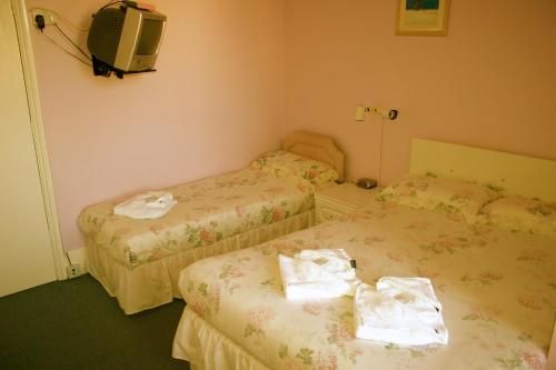 Imagen de la habitación del Cherry Tree Hotel. Foto 8