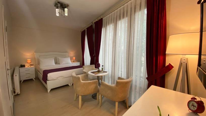 Imagen de la habitación del Chez Bore Boutique Hotel. Foto 8