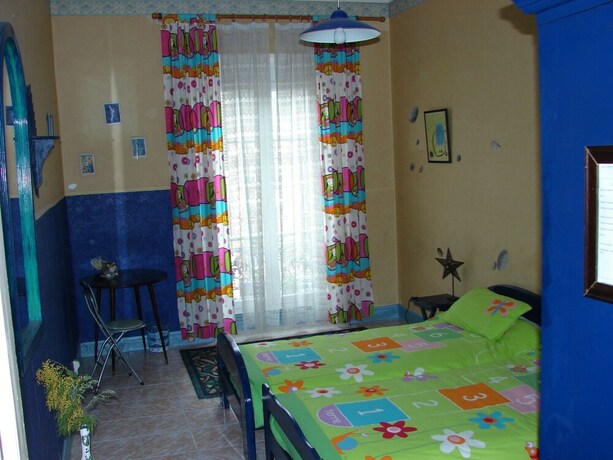 Imagen de la habitación del Chez Brigitte Guesthouse. Foto 28