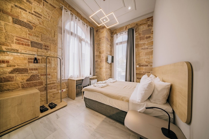 Imagen de la habitación del Chios City Inn. Foto 8