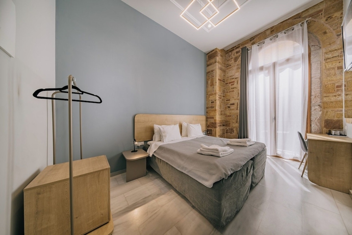 Imagen de la habitación del Chios City Inn. Foto 9