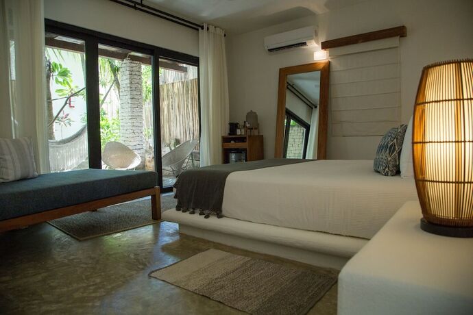 Imagen de la habitación del Chiringuito Tulum. Foto 6