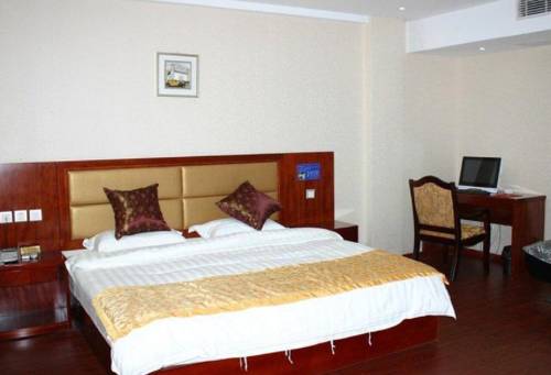 Imagen de la habitación del Chizhou Dushi Business Inn. Foto 1