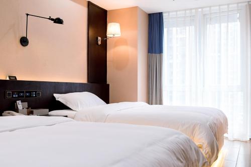 Imagen de la habitación del Chongqing Zhong Ting Apartment. Foto 6