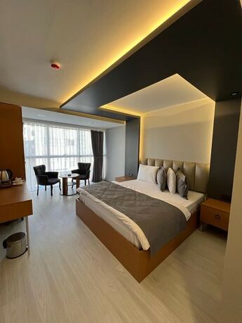 Imagen de la habitación del Ci Plus Hotel. Foto 11