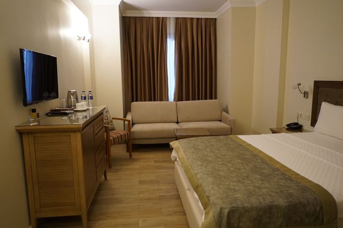 Imagen de la habitación del Cinarli Kasri Hotel. Foto 7