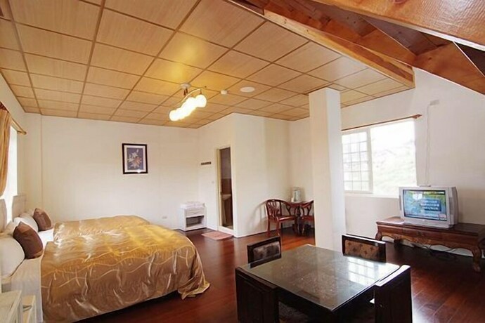 Imagen de la habitación del Cing Jing Homeland Resort Villa. Foto 20