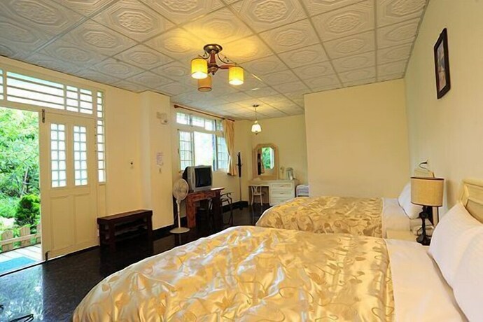 Imagen de la habitación del Cing Jing Homeland Resort Villa. Foto 21