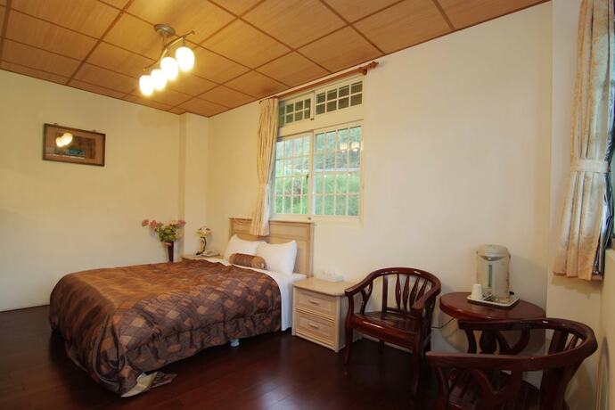 Imagen de la habitación del Cing Jing Homeland Resort Villa. Foto 28