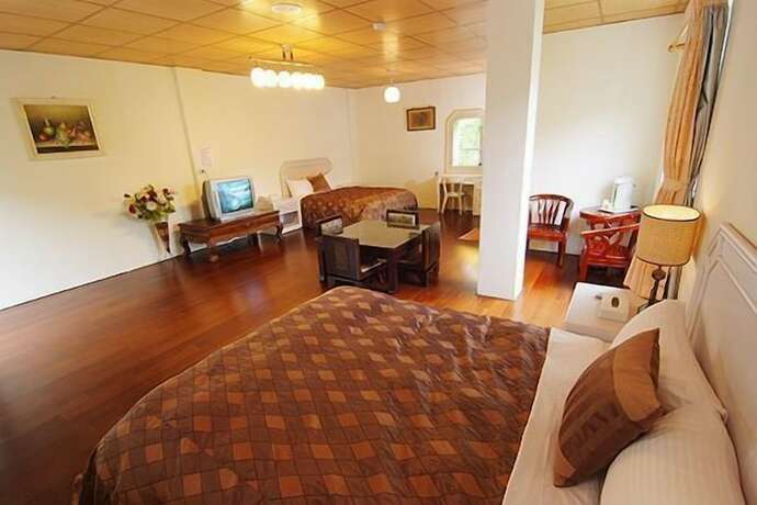Imagen de la habitación del Cing Jing Homeland Resort Villa. Foto 33