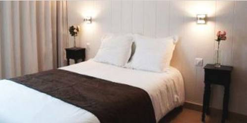 Imagen de la habitación del Citotel Le Clos Du Pontic. Foto 7