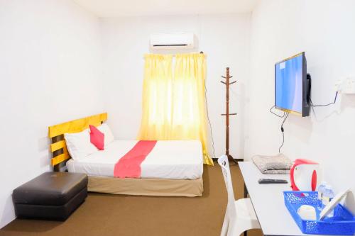Imagen de la habitación del Citra Kadok Hotel & Banquet Hall. Foto 15