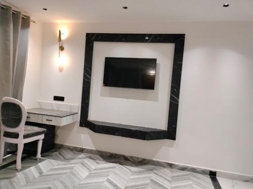 Imagen de la habitación del Citrus Prime Hill Queen Resort. Foto 16