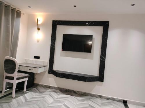 Imagen de la habitación del Citrus Prime Hill Queen Resort. Foto 17