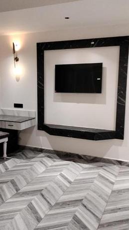 Imagen de la habitación del Citrus Prime Hill Queen Resort. Foto 18