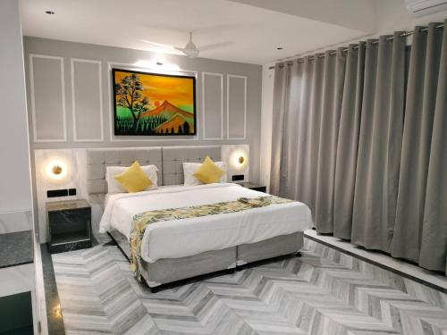 Imagen de la habitación del Citrus Prime Hill Queen Resort. Foto 19