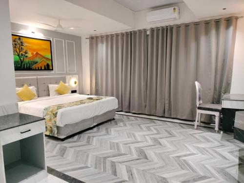 Imagen de la habitación del Citrus Prime Hill Queen Resort. Foto 20