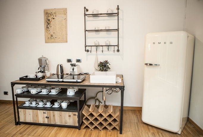 Imagen del bar/restaurante del Città Studi Suites - Top Collection. Foto 3