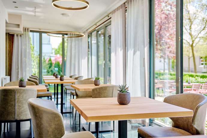 Imagen del bar/restaurante del City Appartementhotel, Bad F&uuml;ssing. Foto 5