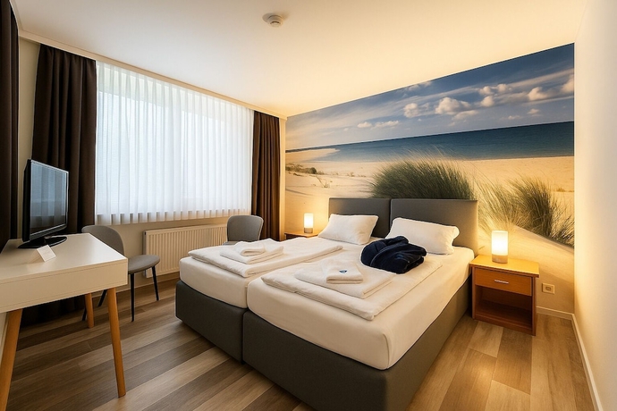 Imagen de la habitación del City Center Hotel Garni Cuxhaven. Foto 10