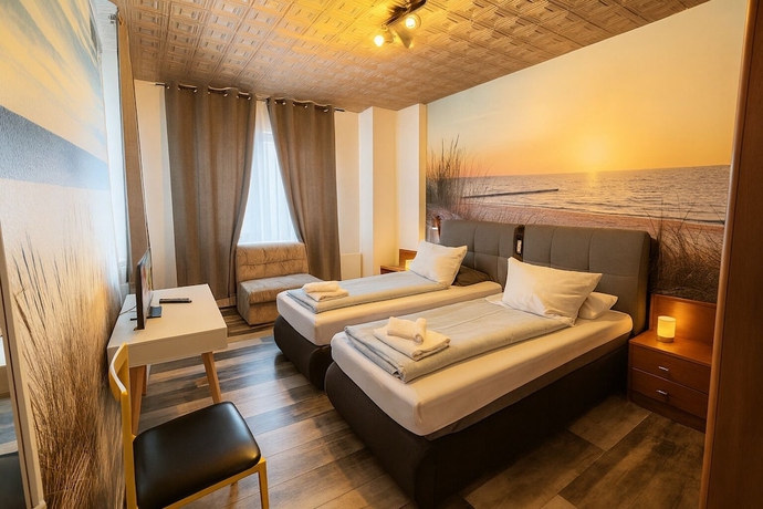 Imagen de la habitación del City Center Hotel Garni Cuxhaven. Foto 12