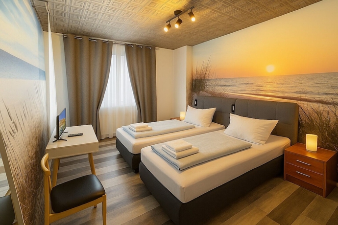 Imagen de la habitación del City Center Hotel Garni Cuxhaven. Foto 14