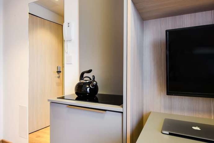 Imagen de la habitación del City Comfort Aparthotel. Foto 10