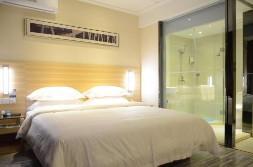 Imagen de la habitación del City Comfort Inn Jiujiang Xunyang Road. Foto 7