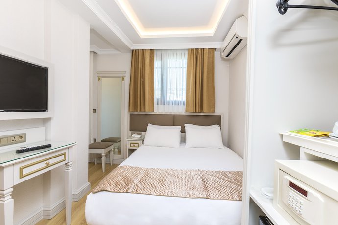 Imagen de la habitación del City Hall Hotel. Foto 7