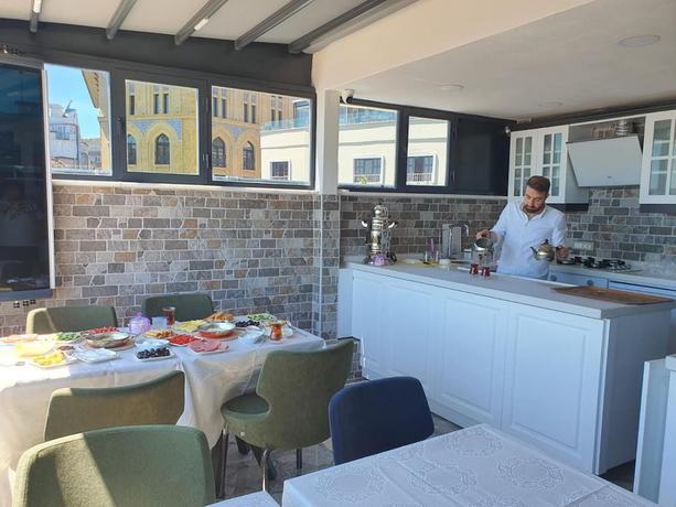 Imagen de la habitación del City Hall Hotel. Foto 11