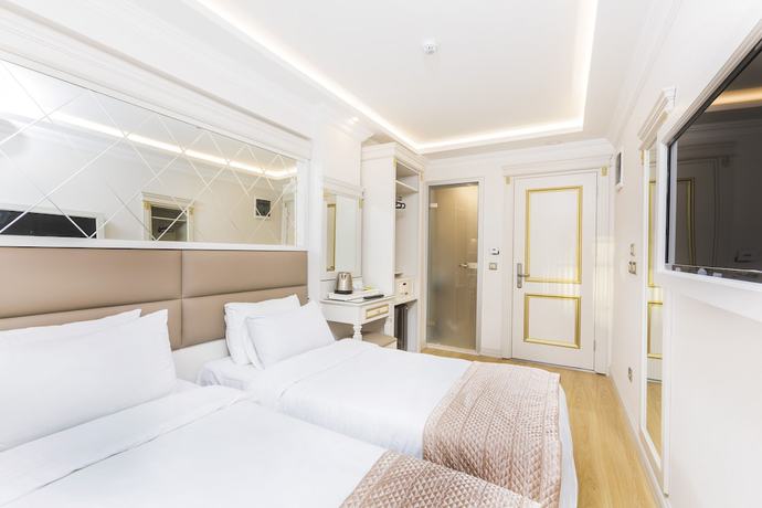 Imagen de la habitación del City Hall Hotel. Foto 12