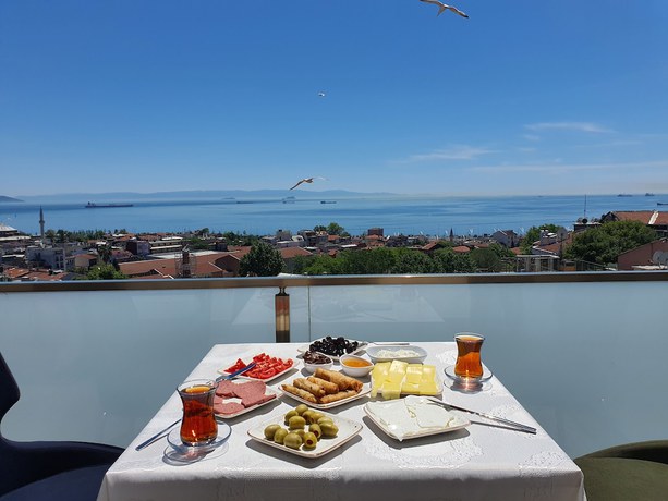 Imagen de la habitación del City Hall Hotel. Foto 16