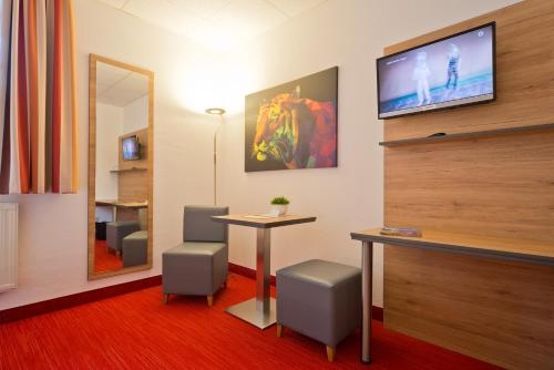 Imagen de la habitación del City Hotel, Chemnitz. Foto 9