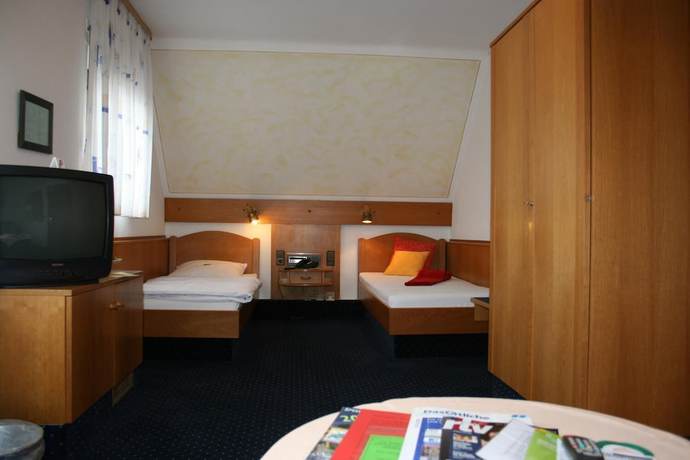 Imagen de la habitación del City Hotel Hanau. Foto 10