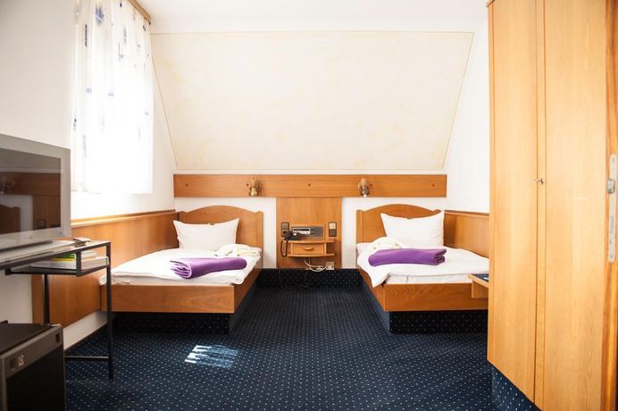 Imagen de la habitación del City Hotel Hanau. Foto 19
