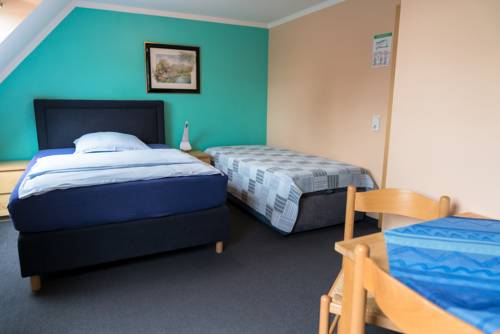Imagen de la habitación del City Hotel Hilden. Foto 7
