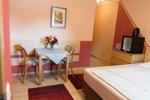 Imagen de la habitación del City Hotel Hilden. Foto 9