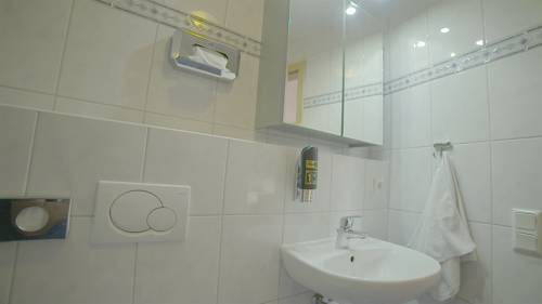 Imagen de la habitación del City Hotel Hilden. Foto 10