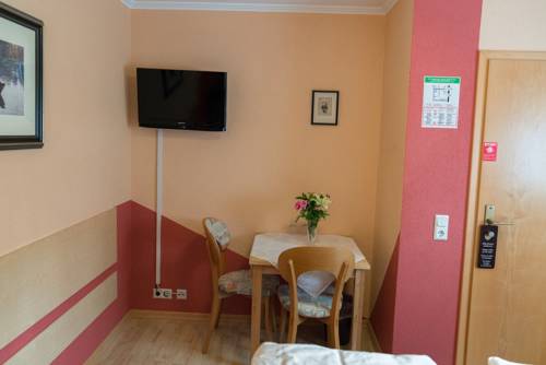 Imagen de la habitación del City Hotel Hilden. Foto 12