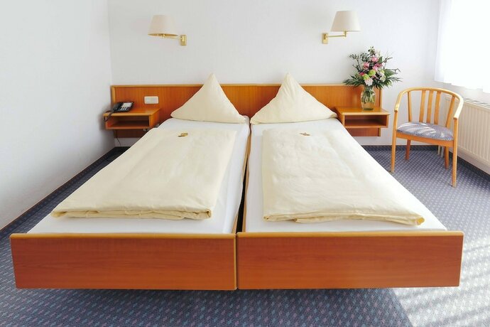 Imagen de la habitación del City Hotel Mark Michelstadt. Foto 15