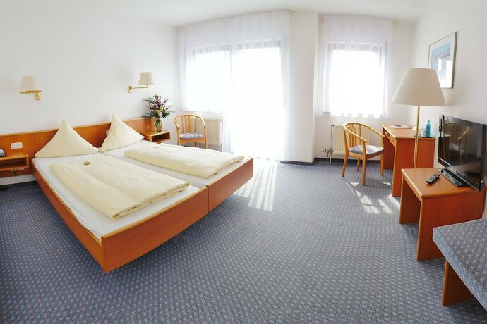 Imagen de la habitación del City Hotel Mark Michelstadt. Foto 20