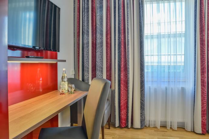 Imagen de la habitación del City Hotel Wetzlar. Foto 16