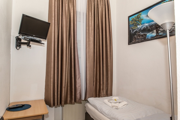 Imagen de la habitación del City-pension-storch. Foto 18