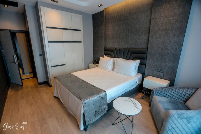 Imagen de la habitación del Class Suit Hotel. Foto 16